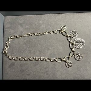 Beautiful costume jewelry necklace silver in color